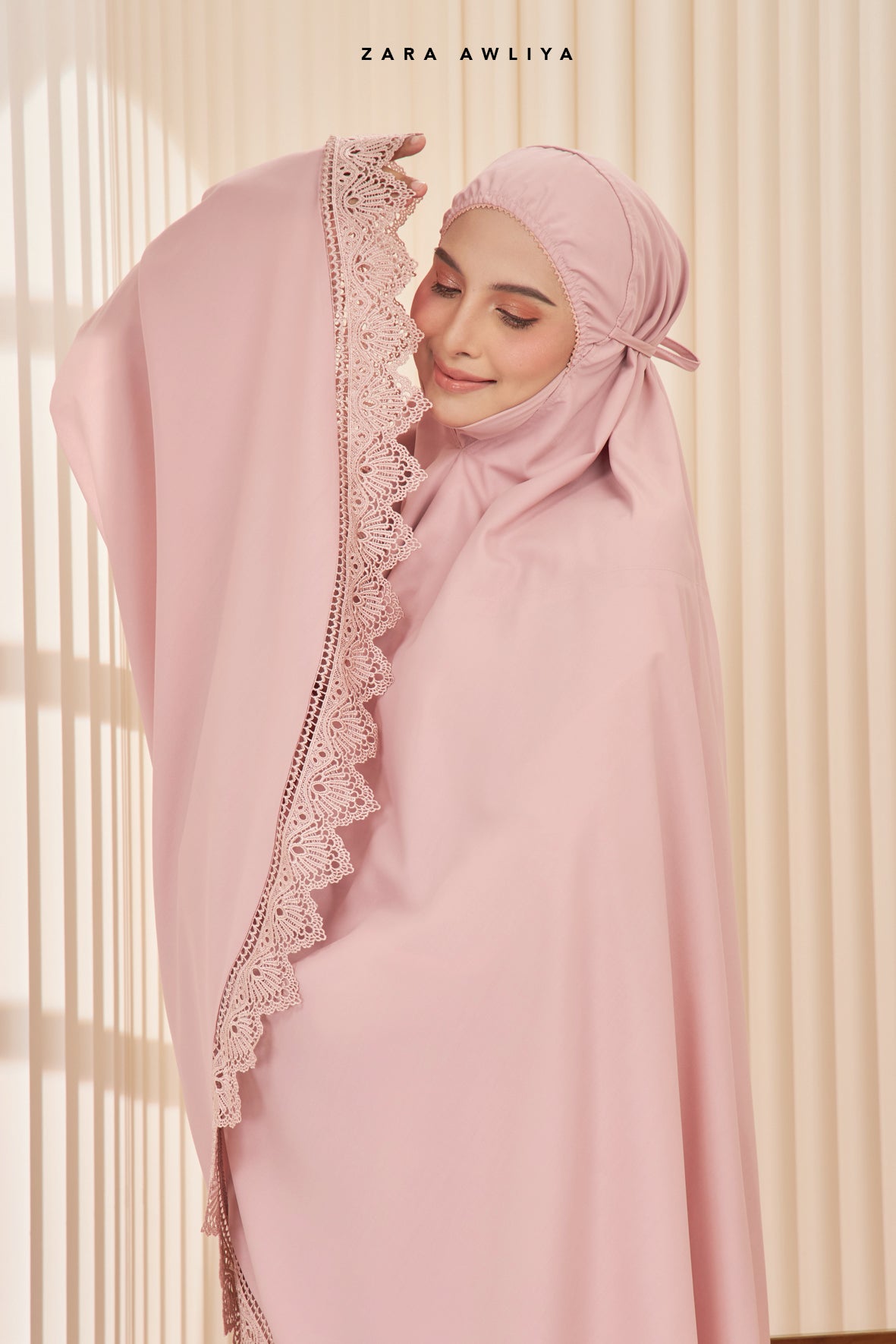 Telekung Emelda