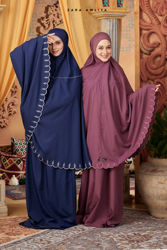 Zara Awliya Telekung Laora in soft fabric with elegant design, displayed on a mannequin, perfect for modest Islamic wear.